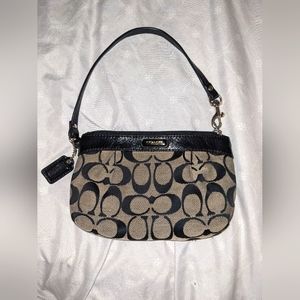 Coach pleated medium wristlet.